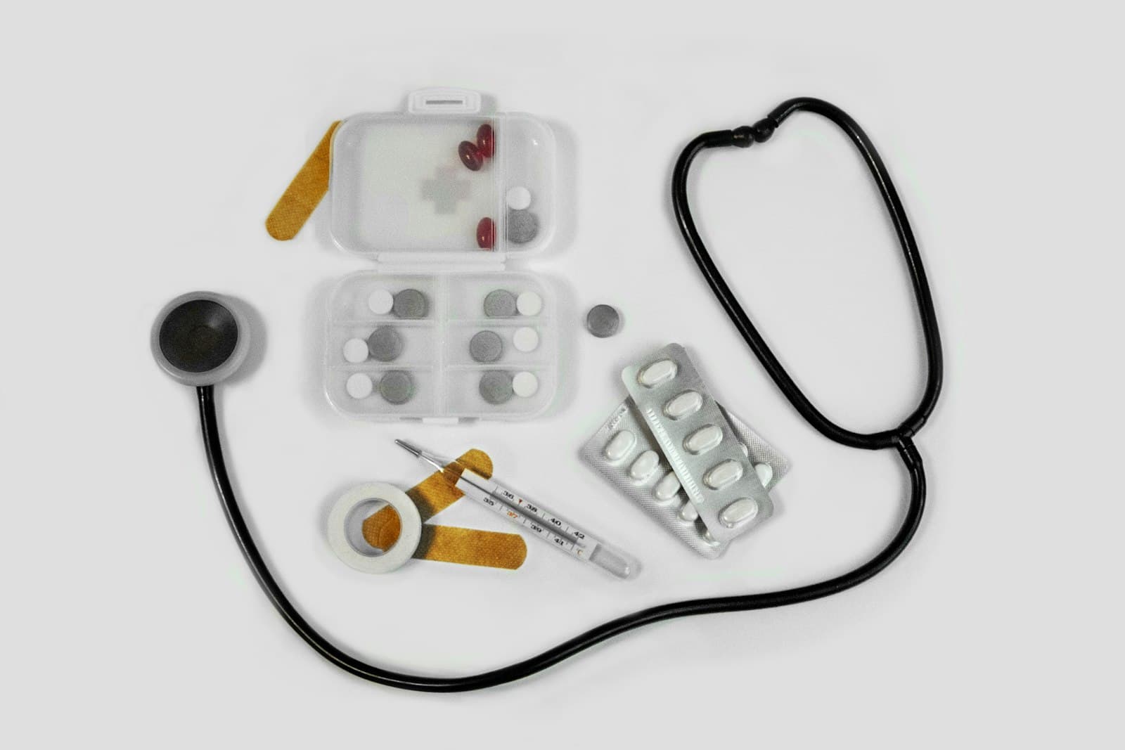 Medical instruments and medicines arranged on a surface